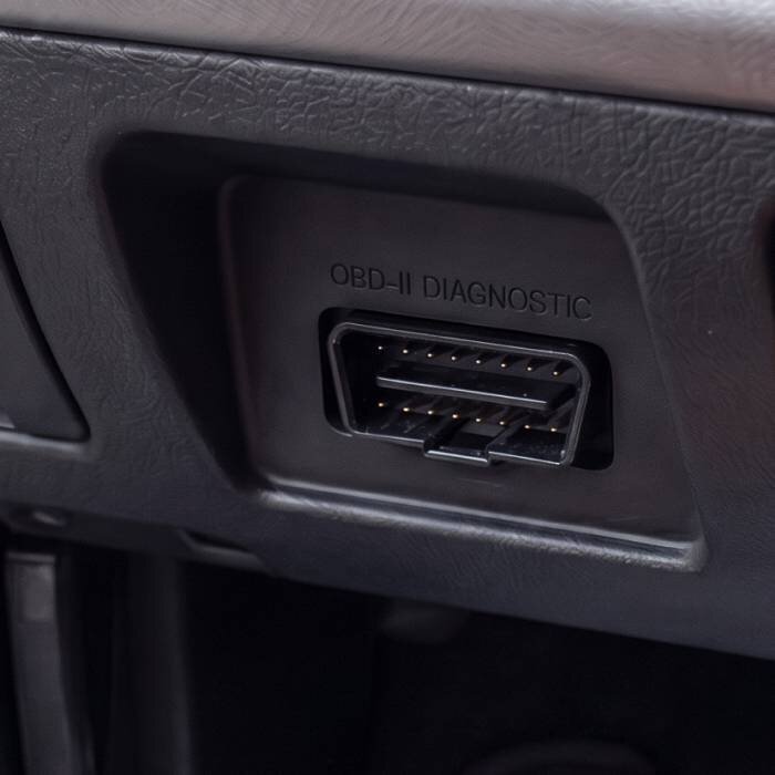 Find the OBD2 port under your dashboard